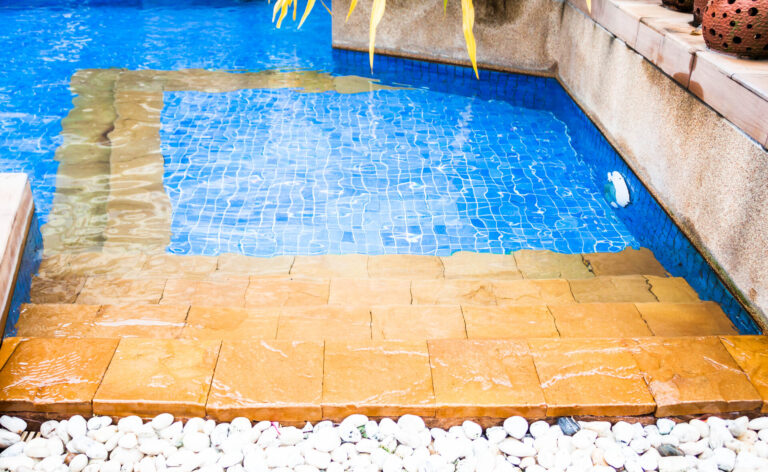 Steps to swimming pool in resort style hotel